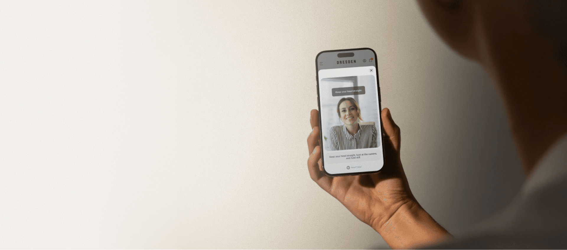 Hand holding a phone running the Dresden Vision app for virtual measurement in Australia.
